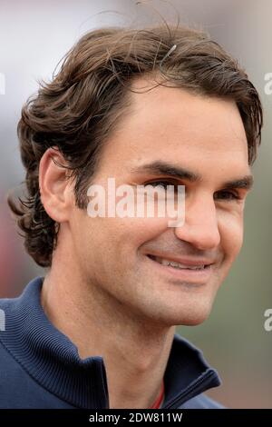 Roger Federer, Suisse, bat 7-5, 6-7 [7], 6-2, 6-4 Dmitry Tursunov, russe, lors de sa 3e partie de l'Open de tennis français au stade Roland Garros à Paris, France, le 30 mai 2014. Photo de Nicolas Briquet/ABACAPRESS.COM Banque D'Images