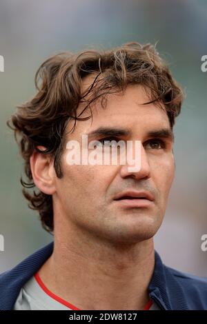 Roger Federer, Suisse, bat 7-5, 6-7 [7], 6-2, 6-4 Dmitry Tursunov, russe, lors de sa 3e partie de l'Open de tennis français au stade Roland Garros à Paris, France, le 30 mai 2014. Photo de Nicolas Briquet/ABACAPRESS.COM Banque D'Images