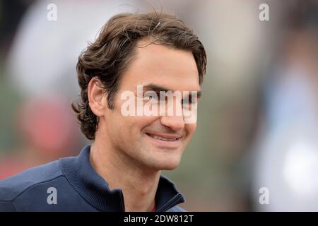 Roger Federer, Suisse, bat 7-5, 6-7 [7], 6-2, 6-4 Dmitry Tursunov, russe, lors de sa 3e partie de l'Open de tennis français au stade Roland Garros à Paris, France, le 30 mai 2014. Photo de Nicolas Briquet/ABACAPRESS.COM Banque D'Images