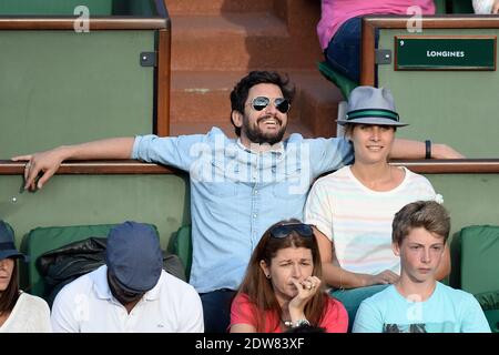 Julie de Bona et son mari regardant un troisième tour de jeu à l'Open de tennis français à l'arène Roland-Garros à Paris, France, le 31 mai 2014. Photo de Laurent Zabulon/ABACAPRESS.COM Banque D'Images