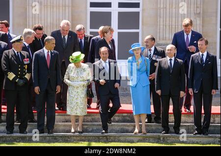 LE président AMÉRICAIN Barack Obama participe à une photo de groupe des dirigeants du monde participant aux cérémonies du 70e anniversaire du jour J au Château de Benouville, en France, le 6 juin 2014. Les cérémonies du jour J marquent le 70e anniversaire du lancement de l'opération Overlord, une vaste opération militaire des forces alliées en Normandie, qui a tourné la vague de la Seconde Guerre mondiale, menant finalement à la libération de la France occupée et à la fin de la guerre contre l'Allemagne nazie. Photo de Christophe petit Tesson/Pool/ABACAPRESS.COM Banque D'Images