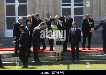 LE président AMÉRICAIN Barack Obama participe à une photo de groupe des dirigeants du monde participant aux cérémonies du 70e anniversaire du jour J au Château de Benouville, en France, le 6 juin 2014. Les cérémonies du jour J marquent le 70e anniversaire du lancement de l'opération Overlord, une vaste opération militaire des forces alliées en Normandie, qui a tourné la vague de la Seconde Guerre mondiale, menant finalement à la libération de la France occupée et à la fin de la guerre contre l'Allemagne nazie. Photo de Denis Allard/Pool/ABACAPRESS.COM Banque D'Images