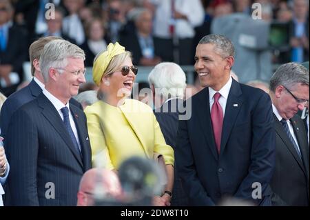 Roi Philippe - Filip de Belgique , le président américain Barack Obama et la reine néerlandaise Maxima.cérémonie internationale de commémoration du jour J à Ouistreham dans le cadre du 70e anniversaire du débarquement de la Seconde Guerre mondiale, à Sword Beach, Ouistreham, Normandie, France, le 06 juin 2014. Photo de Laurent Chamussy/Pool/ABACAPRESS.COM Banque D'Images