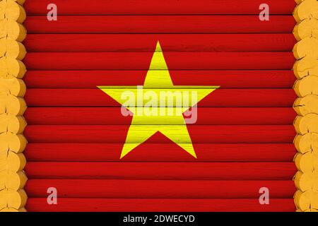 Drapeau national du Vietnam sur fond de mur en bois. Le concept de fierté nationale et un symbole du pays. Drapeaux peints sur une maison Banque D'Images