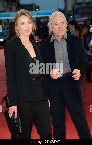 Abel Ferrara et sa femme assistent à la projection du film Get On Up dans le cadre du 40ème Festival du film américain à Deauville, France, le 12 septembre 2014. Photo de Nicolas Briquet/ABACAPRESS.COM Banque D'Images