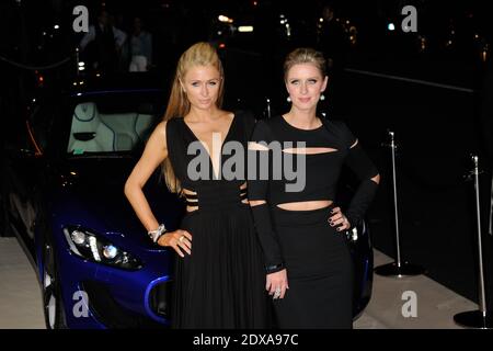 Nicky Hilton et Paris Hilton assistent à la fête de lancement du Cr Fashion Book issue N5 par Carine Roitfeld et Stephen Gan à l'hôtel Peninsula à Paris, France, le 30 septembre 2014. Photo d'Alban Wyters/ABACAPRESS.COM Banque D'Images