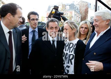 L’ancien président français et candidat à la présidence du principal parti d’opposition de droite français UMP Nicolas Sarkozy arrive pour voter au premier tour des élections, à Paris, en France, le 29 novembre 2014. Photo par ABACAPRESS.COM Banque D'Images