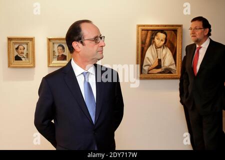 Le Président français François Hollande (L) et le Premier ministre espagnol Mariano Rajoy sont vus lors d'une visite au Musée Picasso dans le quartier du Marais à Paris, en France, le 1er décembre 2014. Photo Pool par Philippe Wojazer/ABACAPRESS.COM Banque D'Images