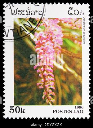 MOSCOU, RUSSIE - 8 AOÛT 2019: Timbre-poste imprimé au Laos montre Dendrobium secundum, série de fleurs, vers 1996 Banque D'Images