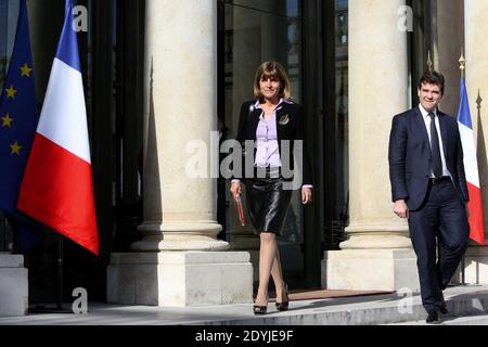 Anne Lauvergeon, ancienne PDG française d'Areva, récemment nommée à la tête de la commission "innovation 2030" pour la technologie et l'industrie, et Arnaud Montebourg, ministre français de la reprise industrielle, quittent l'Elysee Presidential Palace après la commission "innovation 2030" à Paris, le 19 avril 2013. Photo de Stephane Lemouton/ABACAPRESS.COM Banque D'Images