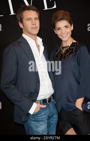 Clotilde Courau et son mari Emanuele Filiberto de Savoie posant au photocall Armani à Paris, France, le 2 juillet 2013, dans le cadre de la semaine de la mode de Paris haute-Couture automne-hiver 2013-2014. Photo de Thierry Orban/ABACAPRESS.COM Banque D'Images