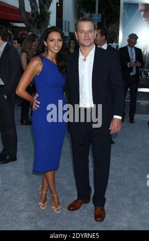 Luciana Barroso et Matt Damon assistent à la première d'Elysium au Regency Village Theatre de Westwood, Los Angeles, CA, USA, le 7 août 2013. Photo de Baxter/ABACAPRESS.COM Banque D'Images