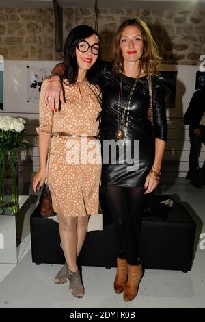 Sylvie Hoarau et Aurelie Saada (Brigitte) assistaient à la fête de la petite bouteille noire Lancome à Paris, en France, le 18 septembre 2013. Photo d'Alban Wyters/ABACAPRESS.COM Banque D'Images