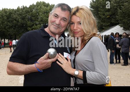 Jean-Marie Bigard et sa femme Lola assistent au tournoi de pétanque au profit de l'association 'Méghanora' qui s'est tenue sur la place des Invalides à Paris, France, le 29 septembre 2013. Photo de Audrey Poree/ABACAPRESS.COM Banque D'Images