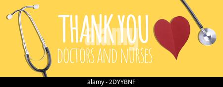 Merci message du personnel médical avec stéthoscope et cœur rouge - bannière Banque D'Images