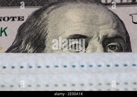 Benjamin Franklin de 100 dollar billet de banque avec masque médical Banque D'Images