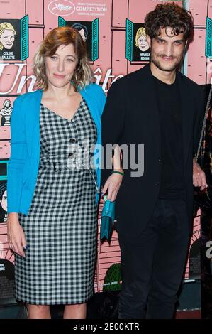 Valeria Bruni-Tedeschi et Louis Garrel arrivent à la première du film un Château en Italie (un Castello en Italie, UN château en Italie) qui s'est tenu à l'UGC les Halles Cinemas à Paris, France, le 29 octobre 2013. Photo de Nicolas Genin/ABACAPRESS.COM Banque D'Images