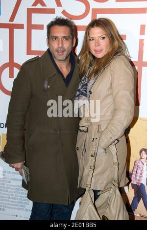 Jean-Pierre Martins et Alexandra Genoves arrivent à la première du film chasse-tête Chinois au cinéma UGC Normandie à Paris, le 25 novembre 2013. Photo de Laurent Zabulon/ABACAPRESS.COM Banque D'Images