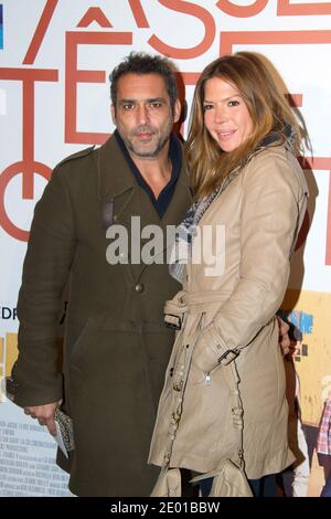 Jean-Pierre Martins et Alexandra Genoves arrivent à la première du film chasse-tête Chinois au cinéma UGC Normandie à Paris, le 25 novembre 2013. Photo de Laurent Zabulon/ABACAPRESS.COM Banque D'Images