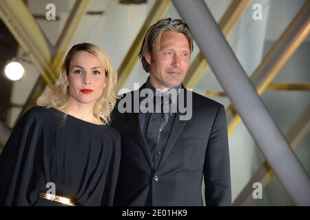 Noomi Rapace et Mads Mikkelsen assistent à la projection du film Waltz pour Monica dans le cadre du 13ème Festival du film de Marrakech, Maroc, le 4 décembre 2013. Photo de Nicolas Briquet/ABACAPRESS.COM Banque D'Images