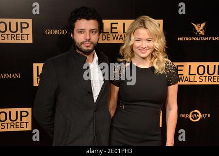 Mabrouk El Mechri et Virginie Efira assistent à la première du film le Loup de Wall Street (le Loup de Wallstreet) qui s'est tenu au Cinéma Gaumont Opera à Paris, France, le 9 décembre 2013. Photo de Nicolas Briquet/ABACAPRESS.COM Banque D'Images