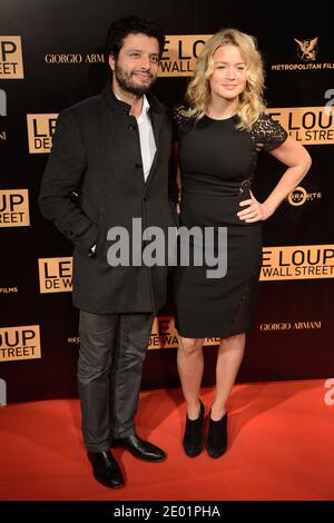 Mabrouk El Mechri et Virginie Efira assistent à la première du film le Loup de Wall Street (le Loup de Wallstreet) qui s'est tenu au Cinéma Gaumont Opera à Paris, France, le 9 décembre 2013. Elle porte une robe de Paule Ka. Photo de Nicolas Briquet/ABACAPRESS.COM Banque D'Images