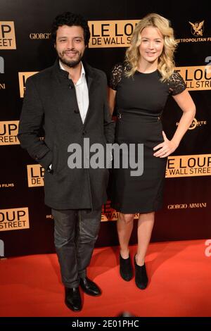 Mabrouk El Mechri et Virginie Efira assistent à la première du film le Loup de Wall Street (le Loup de Wallstreet) qui s'est tenu au Cinéma Gaumont Opera à Paris, France, le 9 décembre 2013. Elle porte une robe de Paule Ka. Photo de Nicolas Briquet/ABACAPRESS.COM Banque D'Images