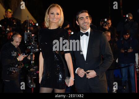 M. Abittan et Adriana Karembeu assistent aux 15e Prix de la musique NRJ qui se tiennent au Palais des Festivals de Cannes, France, le 14 décembre 2013. Photo de Nicolas Briquet/ABACAPRESS.COM Banque D'Images