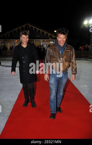 Igor et Grichka Bogdanoff lors de l'inauguration de la patinoire temporaire à Trocadéro, France, le 19 décembre 2013. Photo de Thierry Plessis/ABACAPRESS.COM Banque D'Images