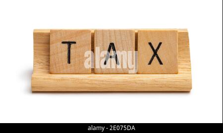 La lettre en bois bloque l'orthographe de la limite de taxe. Banque D'Images