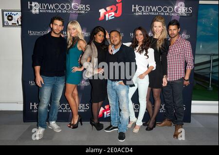 Kevin Miranda, Caroline Receveur, Ayem Nour, Kamel Djibaoui, Laura Coll (alias Sandra), Et Sylvia Jagieniak (alias Chloe) et Nicolas Suret participant au Photocall pour la conférence de presse de la nouvelle série télévisée de réalité scénarisée NRJ 12 Hollywood Girls - une Nouvelle vie en Californie qui s'est tenue au bureau du Groupe NRJ , le 20 février 2012 à Paris, France. Photo de Nicolas Genin/ABACAPRESS.COM Banque D'Images