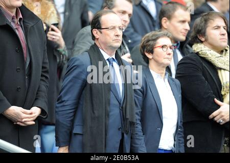Candidat socialiste à l'élection présidentielle française François Hollande à côté du maire de Rouen et conseiller sportif Valerie Fourneyron lors du tournoi Rugby RBS 6 Nations, France contre Angleterre au Stade de France à Saint-Denis, près de Paris, France le 11 mars 2012. L'Angleterre a gagné 24-22. Photo par ABACAPRESS.COM Banque D'Images