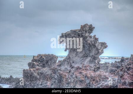 Yongduam Rock à Jeju City, République de Corée Banque D'Images