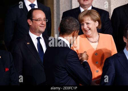 Le président français François Hollande, la chancelière allemande Angela Merkel et le président américain Barack Obama posent pour la photo de groupe lors du sommet de l'OTAN de 2012 à Chicago, Illinois, il, États-Unis, le 20 mai 2012. Photo de Ludovic/Pool/ABACAPRESS.COM Banque D'Images