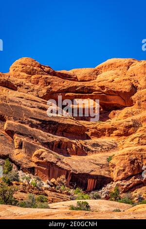 Pothole Arch dans le parc national d'Arches, Utah Banque D'Images