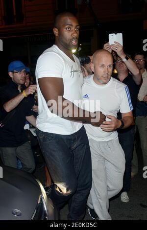 Teddy Riner arrive à la fête de l'équipe olympique française qui s'est tenue à la Cantine du Faubourg à Paris, en France, le 13 août 2012. Photo de Nicolas Briquet/ABACAPRESS.COM Banque D'Images