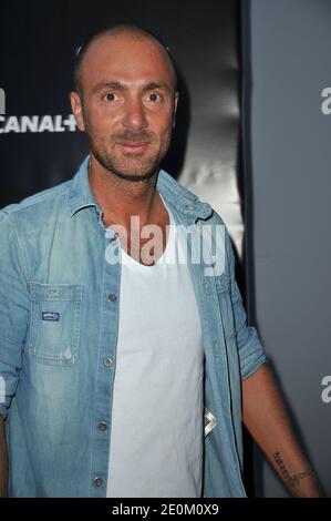 Christophe Dugarry arrivant au Canal plus Party pour présenter les programmes de la saison à venir à la Cité de la mode et du Design à Paris, France, le 6 septembre 2012. Photo de Giancarlo Gorassini/ABACAPRESS.COM Banque D'Images