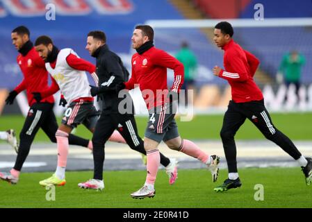 John Fleck (au centre) de Sheffield United se réchauffe sur le terrain avant le début du match de la Premier League à Selhurst Park, Londres. Banque D'Images