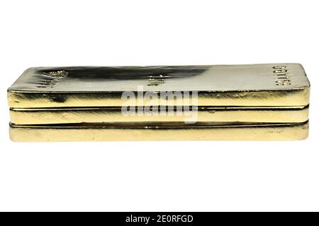 trois lingots d'or de 1 kg isolés sur fond blanc Banque D'Images