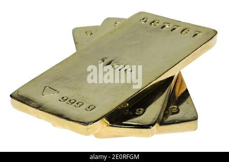 trois lingots d'or de 1 kg isolés sur fond blanc Banque D'Images