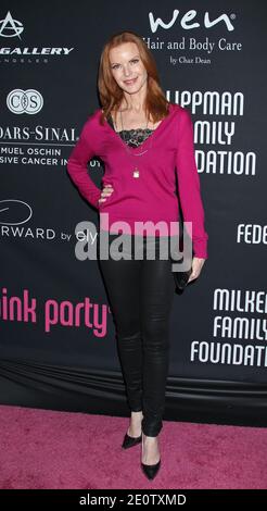 Marcia Cross arrive pour la 8e fête annuelle Pink Party au profit du Cedars-Sinai Women's cancer Program, qui s'est tenue à Hanger 8 à l'aéroport de Santa Monica, Los Angeles, CA, États-Unis, le 27 octobre 2012. Photo de Baxter/ABACAPRESS.COM Banque D'Images