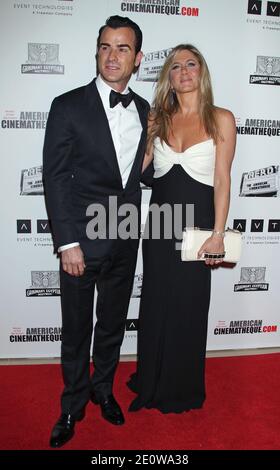 Justin Theroux, Jennifer Aniston, le 26e Gala du Prix Cinematheque américain en l'honneur de Ben Stiller à l'hôtel Beverly Hilton de Beverly Hills, Californie. 15 novembre 2012. (En photo : Justin Theroux, Jennifer Aniston). Photo de Baxter/ABACAPRESS.COM Banque D'Images