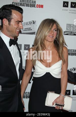 Justin Theroux, Jennifer Aniston, le 26e Gala du Prix Cinematheque américain en l'honneur de Ben Stiller à l'hôtel Beverly Hilton de Beverly Hills, Californie. 15 novembre 2012. (En photo : Justin Theroux, Jennifer Aniston). Photo de Baxter/ABACAPRESS.COM Banque D'Images