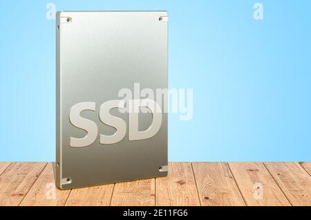 Disque SSD SSD sur les planches en bois, rendu 3D Banque D'Images