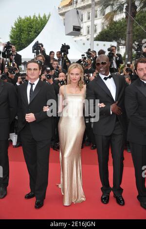 (G-D) Benoit Magimel, Diane Kruger et Djimon Hounsou arrivent pour la projection de la « beauté rampante » présentée en compétition dans la section des longs métrages dans le cadre du 64ème Festival International du film de Cannes, au Palais des Festivals de Cannes, dans le sud de la France, le 12 mai 2011. Photo de Hahn-Nebinger-Genin/ABACAPRESS.COM Banque D'Images