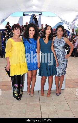 (R-L) Biyouna, Sabrina Ouazani, Leila Bekhti et Hafsia Herzi lors d'une photo pour le film 'The Source' (titre original : 'La Source des femmes') présenté en compétition dans la section longs métrages dans le cadre du 64ème Festival international du film de Cannes, au Palais des Festivals de Cannes, dans le sud de la France, le 21 mai 2011. Photo de Hahn-Nebinger-Genin/ABACAPRESS.COM Banque D'Images