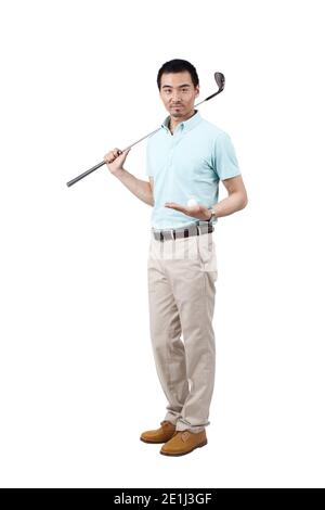 Jeune homme portant un costume et golf photo de haute qualité Banque D'Images