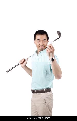 Jeune homme portant un costume et golf photo de haute qualité Banque D'Images