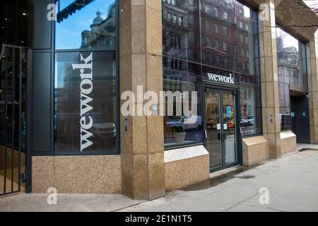 London- WeWork filiale de la City of London, une société américaine d'immobilier commercial qui fournit des espaces de travail partagés flexibles Banque D'Images