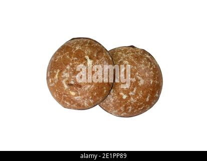 Lebkuchens de pain d'épice glacé au chocolat isolé sur blanc. Pain d'épice rond allemand appelé « Lebkuchen » Banque D'Images